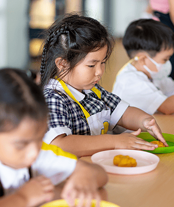 Girl working with plasticine in an art class at Brighton College Vibhavadi, promoting creativity and expression in a premium British international school.
