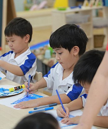 Pupils participating in art activities that encourage imagination, self-expression, and creative exploration at a British school in Bangkok.