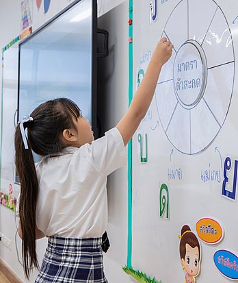 Pupils developing their Thai language skills through classroom learning at an international school in Bangkok.