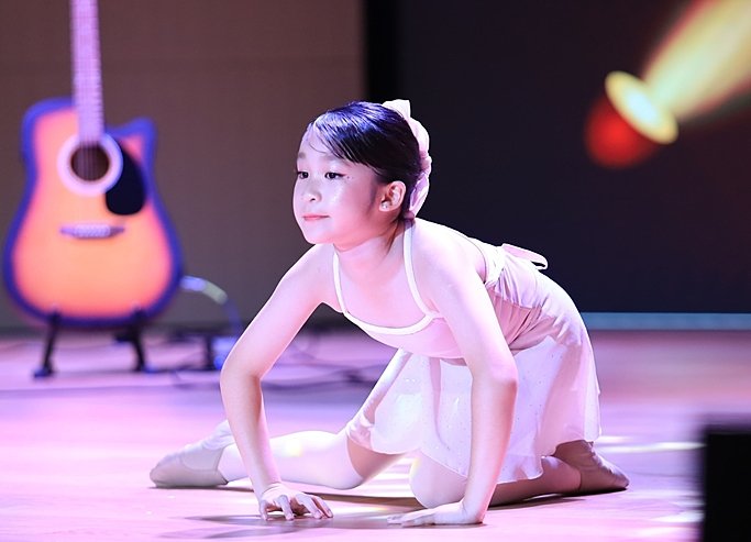  Prep pupils performing together on stage at Brighton College Vibhavadi, a top international school in Thailand 