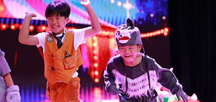  Key Stage 1 pupils performing in Oink!, a fun and imaginative retelling of The Three Little Pigs at Brighton College Bangkok Vibhavadi. 