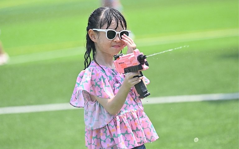  Pupils celebrating Songkran through interactive activities that promote kindness, respect, and teamwork. 