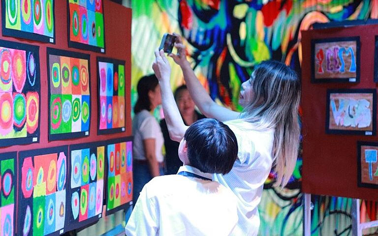  Year 5 pupils celebrating creativity and artistic expression through their end-of-topic art exhibition. 