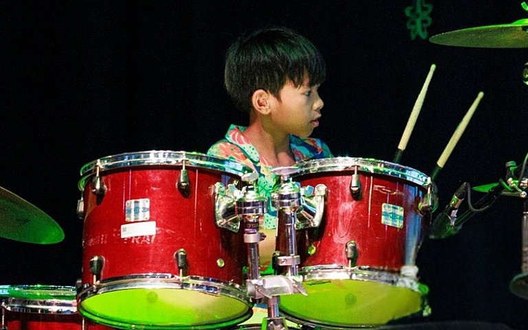  Year 5 and Year 6 pupils celebrating Songkran through music, teamwork, and joyful performances. 