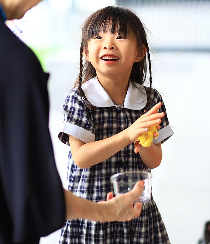  Pupils experimenting with artistic techniques and developing creative thinking through a British curriculum education. 