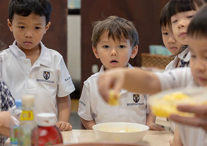  Pupils learning cooking skills in class at Brighton College Vibhavadi, supporting hands-on learning 
