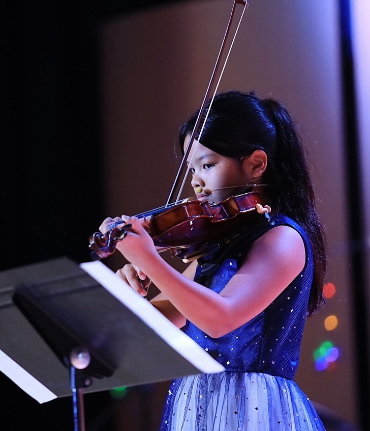  Pupil playing the violin as part of the Music Scholarship programme at Brighton College Vibhavadi, a leading international school in Bangkok 