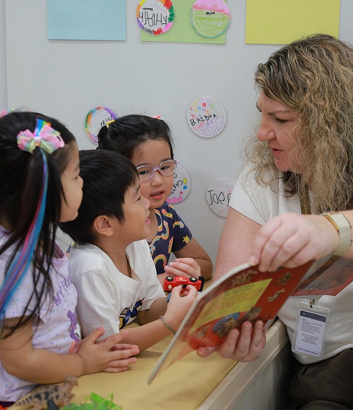  Pupils engaging in classroom activities that encourage curiosity, confidence, and a lifelong love of learning at a British international school. 