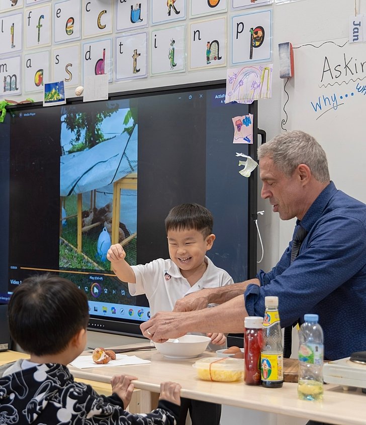  Teacher guiding a Reception class at Brighton College Vibhavadi, a leading Early Years international school in Bangkok 